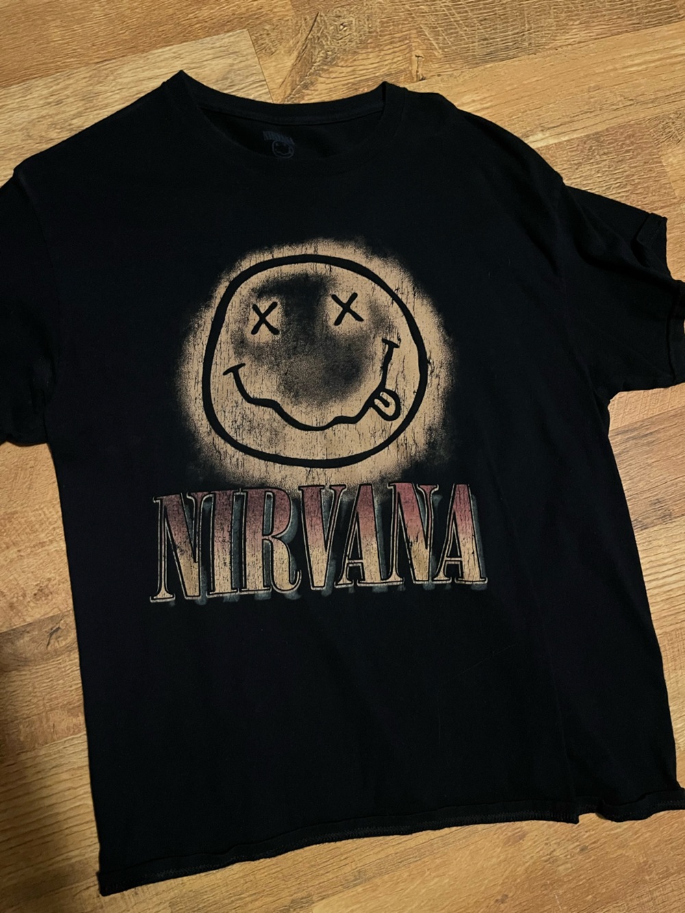 NIRVANA Black Tee with Faded Smile Logo and Gradient Band Name